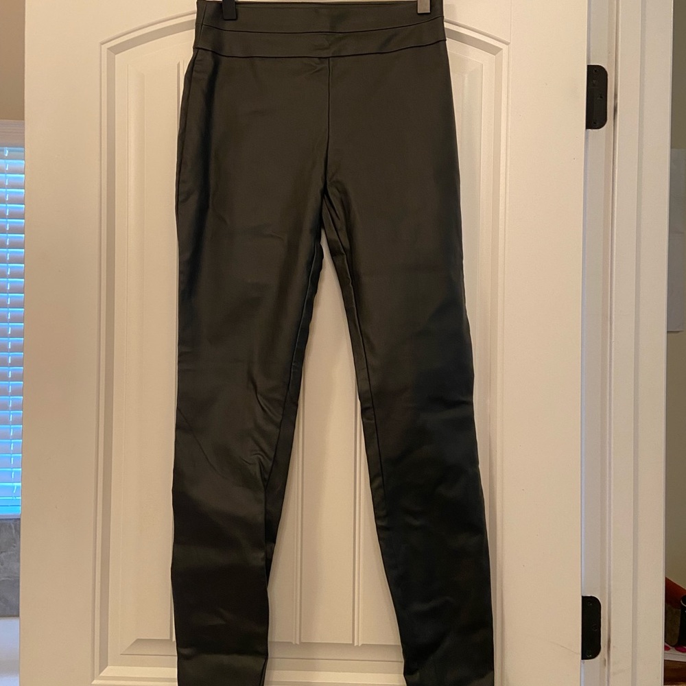 Brand new faux-leather skinny pants with tags.